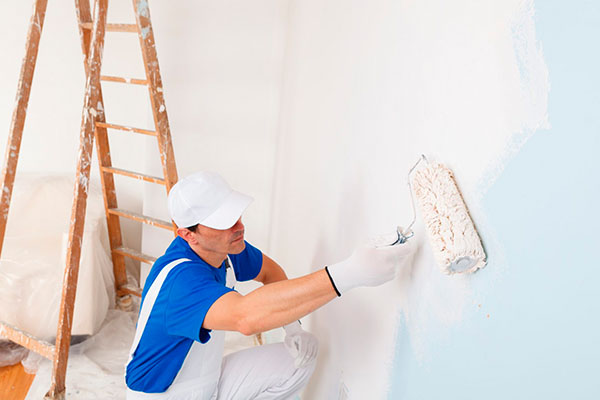 Cabinet painting in Simi Valley kitchen showing before and after